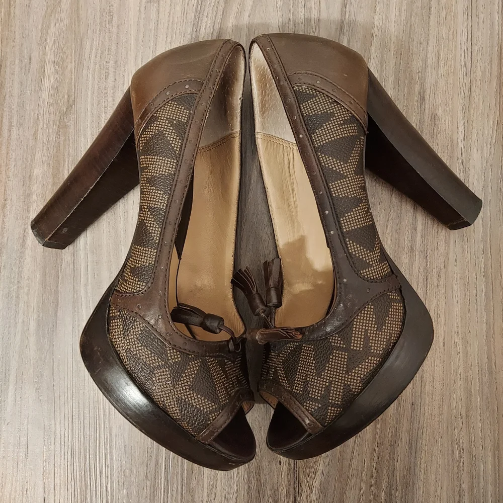 Michael kors monogrammed peep toe tassle heels